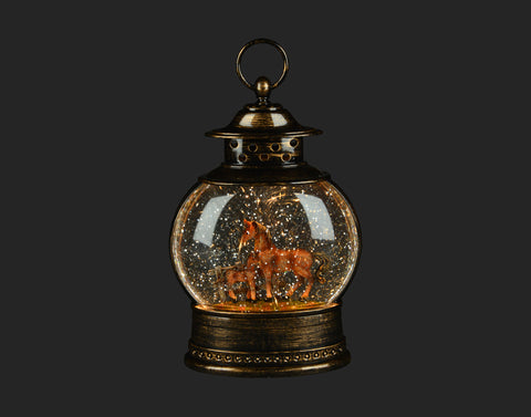 Globe lumineux cheval avec neige tourbillonnante