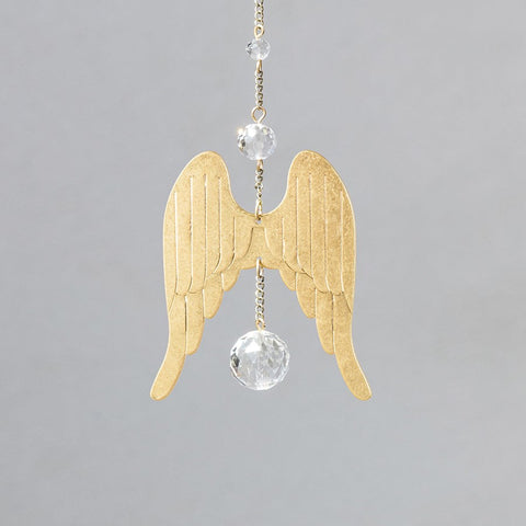 Capteur de soleil – Ailes de protection dorées