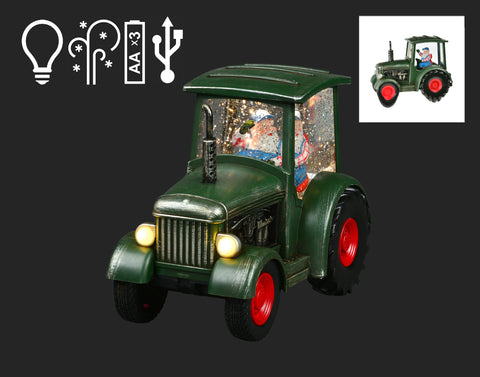 Tracteur vert avec boule d’eau et Père Noël