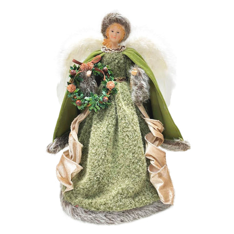 Ange de Noël avec robe verte et ailes blanches
