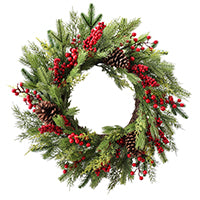 Couronne de pin avec cocottes et baies rouges