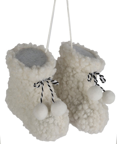 Ornement bottillons blancs avec pompons