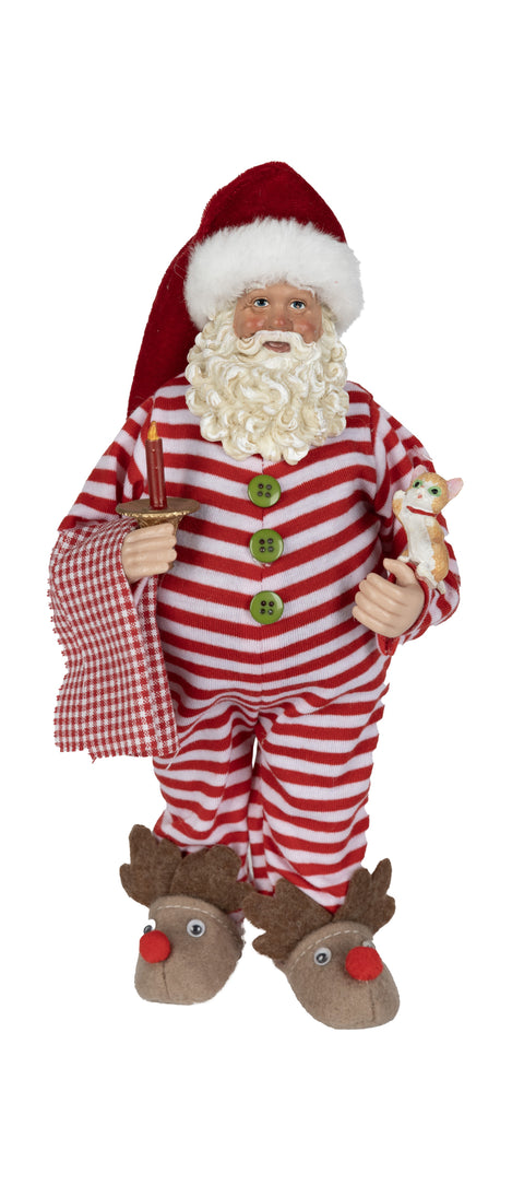 Père Noël en pyjama rayé rouge et blanc