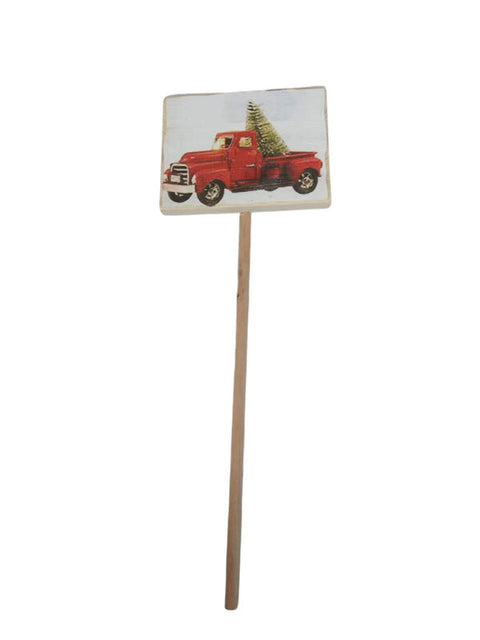 Camion rouge sur tige