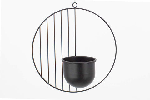 Pot rond sur fond rond noir