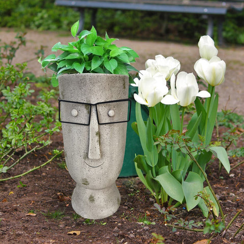 Vase visage en ciment