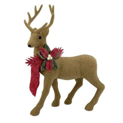 Cerf décoratif debout avec écharpe rouge et houx