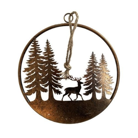 Décoration murale ronde en métal avec renne et forêt de sapins