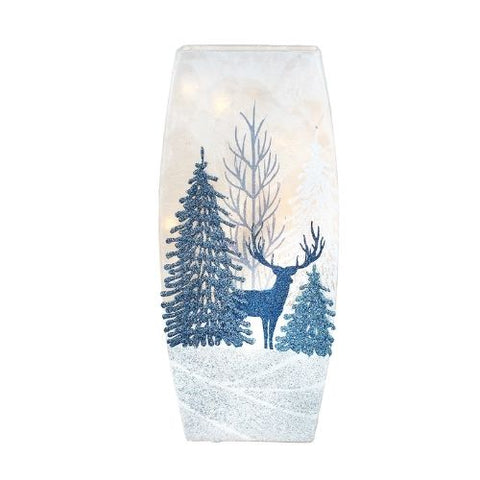 Lanterne décorative avec cerf et sapins