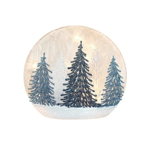 Lanterne avec sapins enneigés