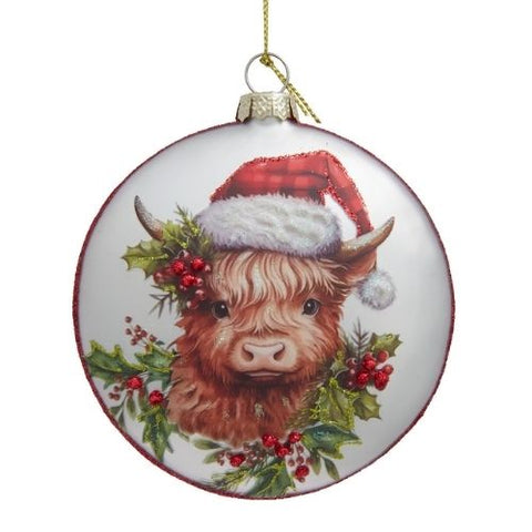 Ornement rond en verre vache Highland avec bonnet de Noël