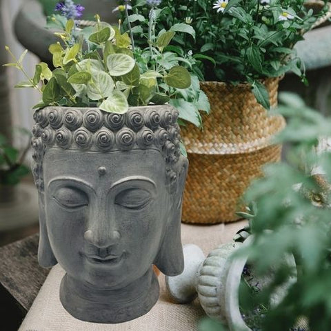 Vase décoratif en forme de tête de Bouddha