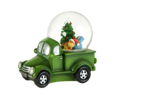 Camion vert avec boule à neige