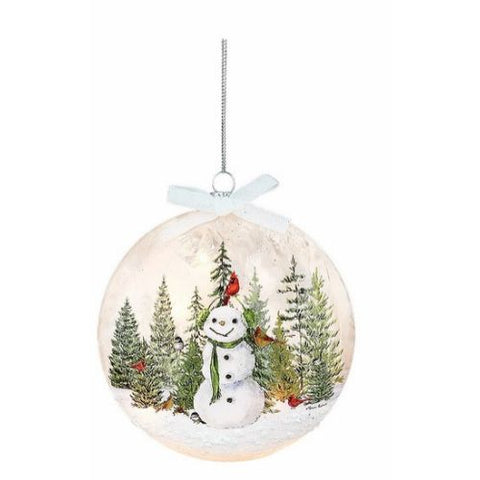 Boule de Noël illuminée Bonhomme de neige joyeux et oiseaux en forêt