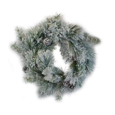 Couronne de sapinage enneigée