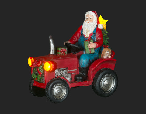 Décoration lumineuse Père Noël sur tracteur