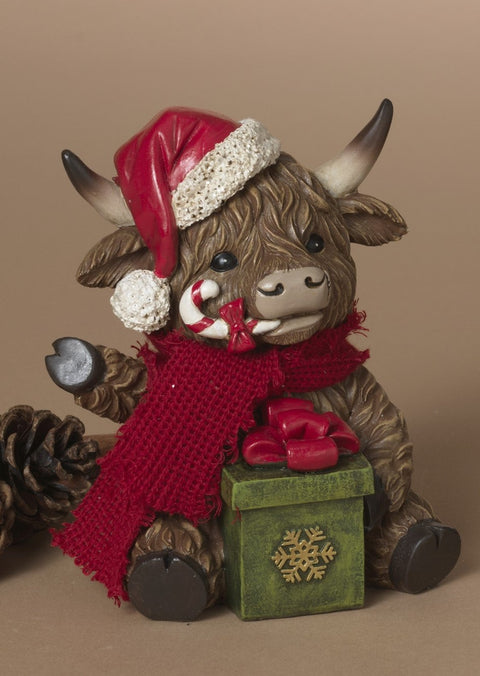 Vache Highland festive en résine avec cadeau