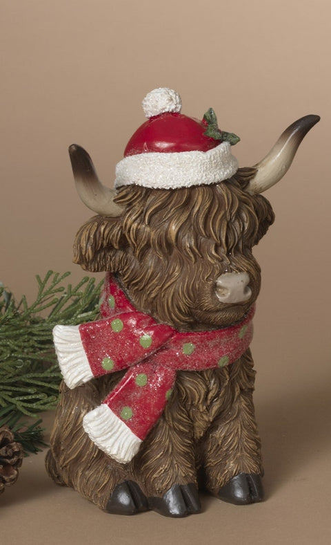 Vache Highland festive en résine avec tuque et foulard