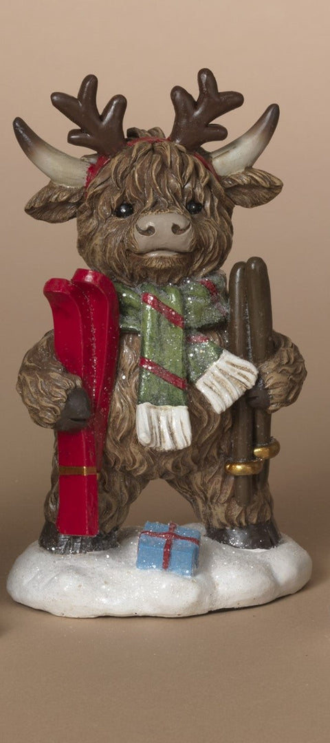 Vache Highland avec skis