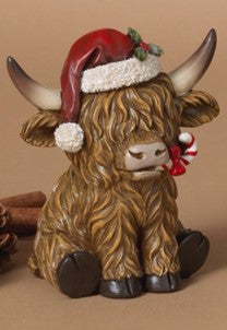 Vache festive en résine avec tuque de Noël