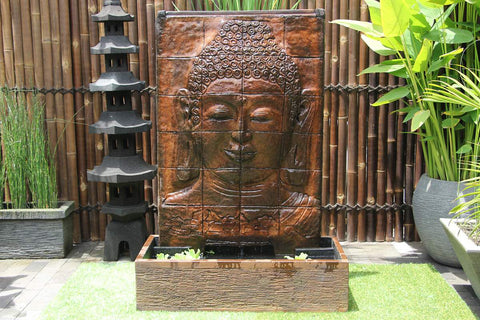 Fontaine à visage de bouddha
