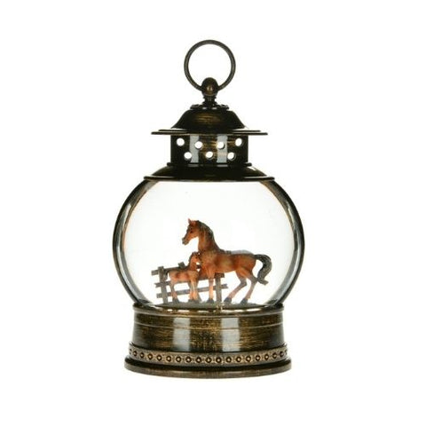 Globe lumineux cheval avec neige tourbillonnante