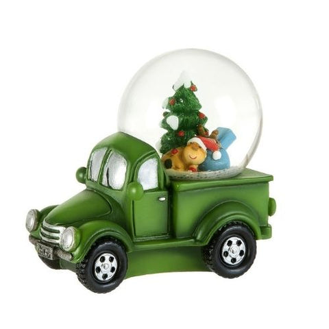 Camion vert avec boule à neige