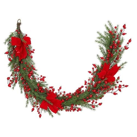 Guirlande de pin avec baies rouges et boucles en velours