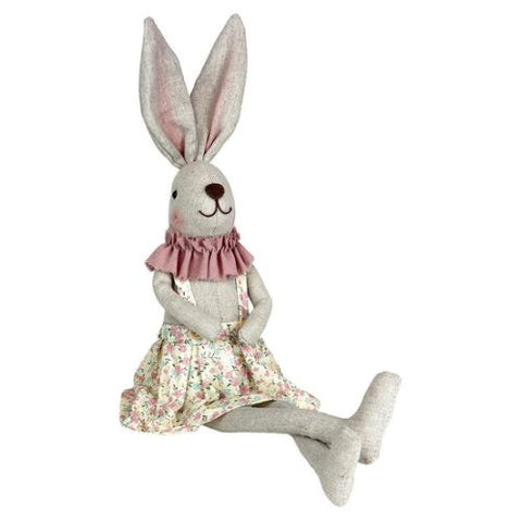 Lapin fille assis rose et crème