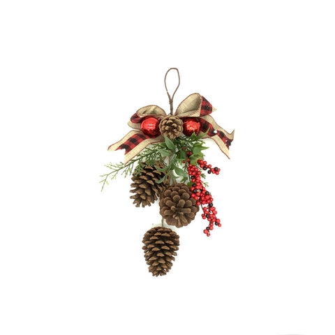 Noeud rouge de Noël avec baies et cocottes