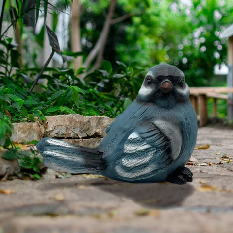 Grand oiseau sculpté en bois simulé bleu