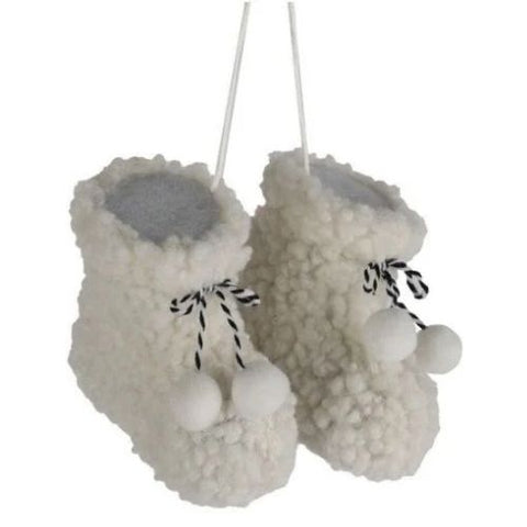Ornement bottillons blancs avec pompons