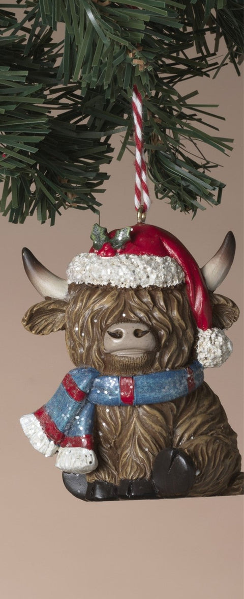 Ornement de Vache Highland avec tuque et foulard bleu