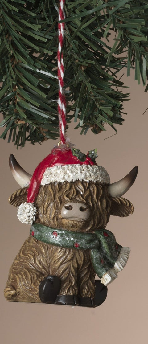Ornement de Vache Highland avec tuque rouge et foulard vert