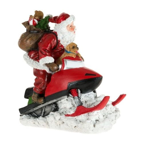 Père Noël en motoneige avec cadeaux