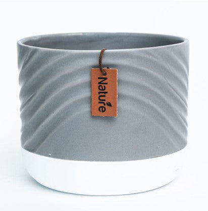 Vase gris à base blanche