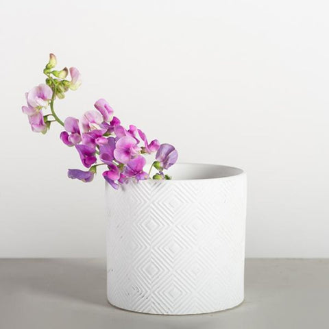 Vase blanc avec motifs
