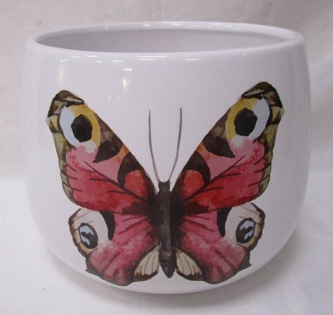 Vase blanc à motif de papillon
