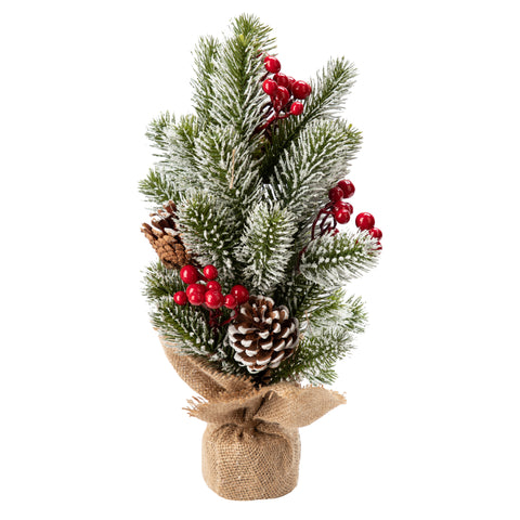 Petit sapin enneigé avec baies rouges et cocottes