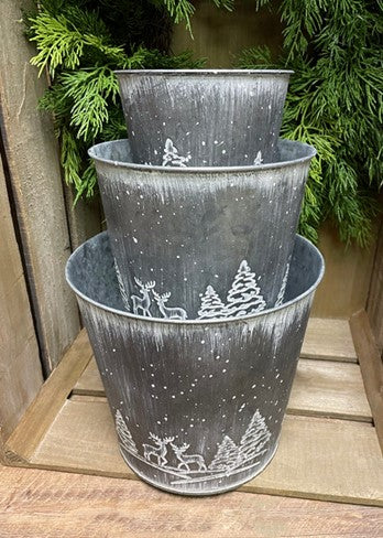 Seau en métal motif cerf et sapins