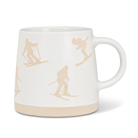 Tasse en grès à motif de skieurs