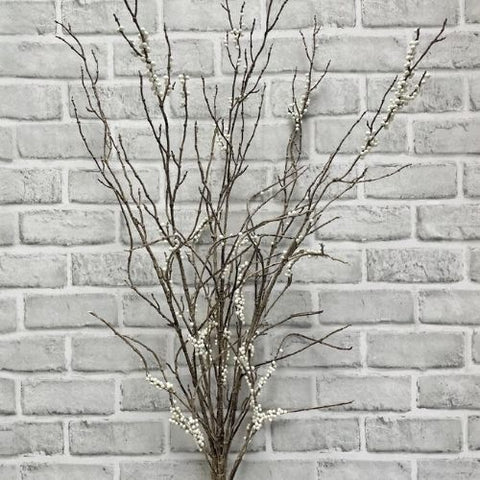 Bouquet de branches avec baies crème artificielles