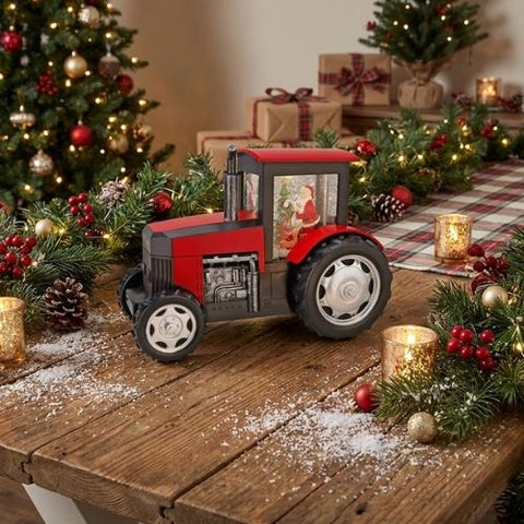 Tracteur lumineux avec père Noël et effet boule à neige