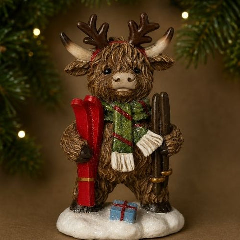 Vache Highland avec skis