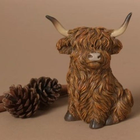 Figurine décorative Vache Highland assise