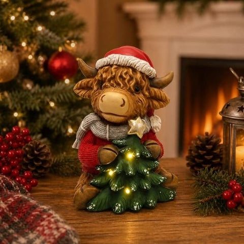 Vache Highland décorative avec sapin lumineux