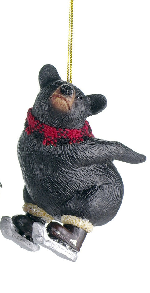Ornement d'ours s'apprêtant à tomber