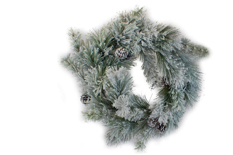 Couronne de sapinage enneigée